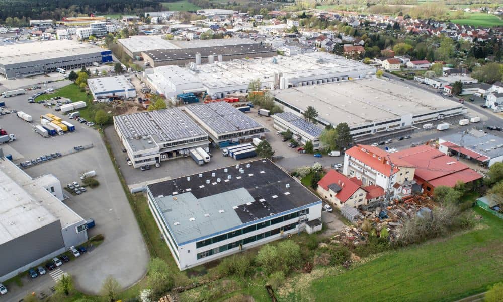 Aerial view of an industrial park showing property boundaries and infrastructure, illustrating the importance of an ALTA Survey for accurate development planning.