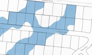 FEMA-style flood map overlay with property survey parcel lines showing high-risk flood zones