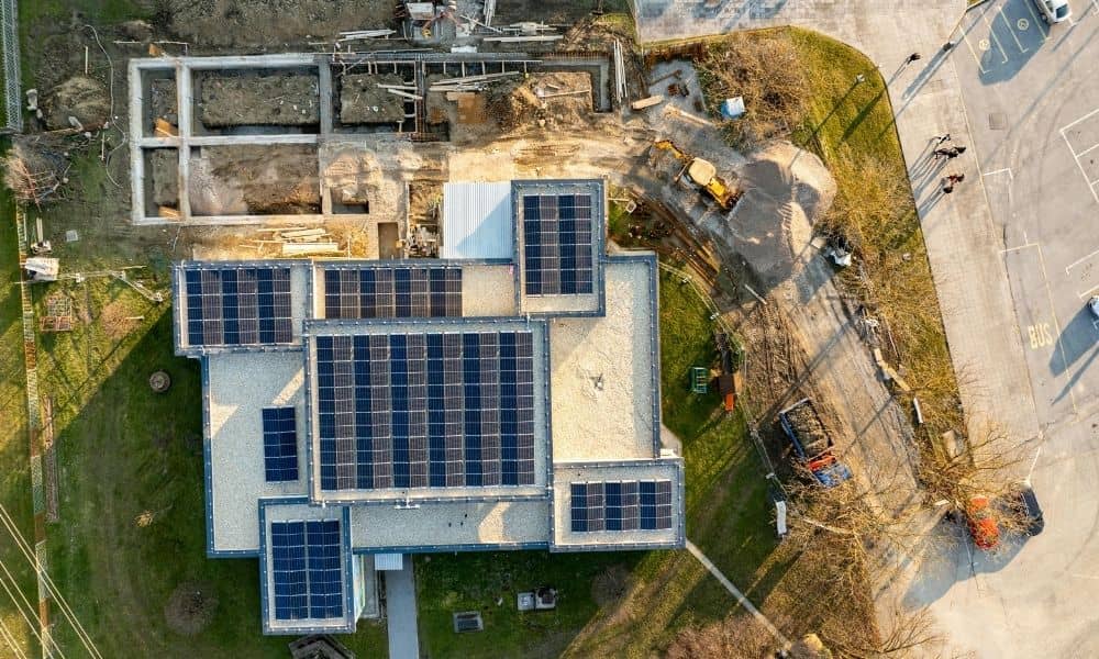 Construction staking survey solar storm site - ALTA Survey Alabama Aerial view of a construction site with solar panels and foundation work, symbolizing how solar storms can impact construction staking survey accuracy.