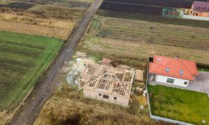 Drone survey view showing two neighboring properties with unclear boundaries