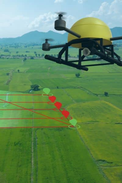Drone land surveying illustrating mapped flight paths and land coverage for terrain analysis