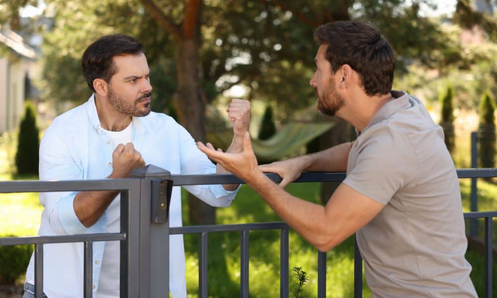 Residential fence between neighboring properties - ALTA Survey Alabama Property line surveys help resolve disputes when a fence sits close to a boundary between neighboring homes