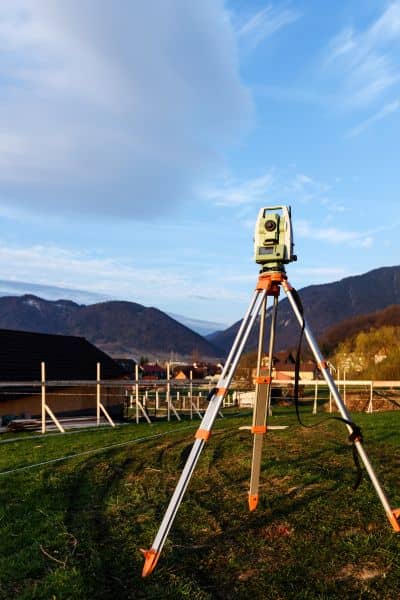 Land surveyor equipment property boundary - ALTA Survey Alabama Survey equipment used in a boundary line survey to measure property limits before fence construction