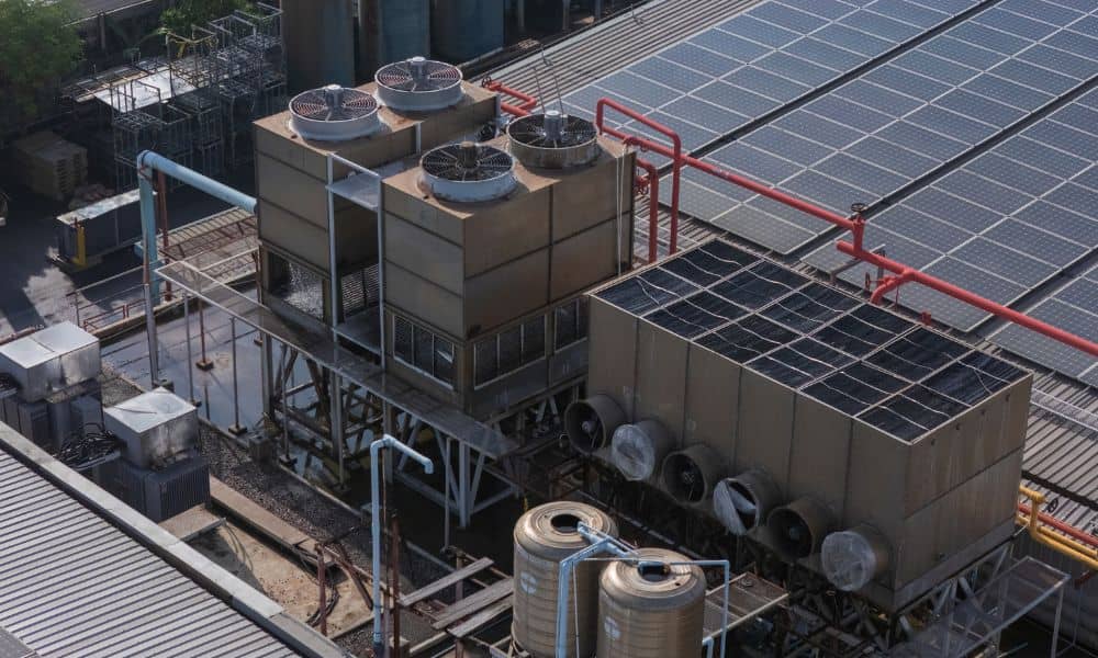Data center cooling equipment and utility pipes on a commercial property, highlighting infrastructure considerations in an ALTA survey