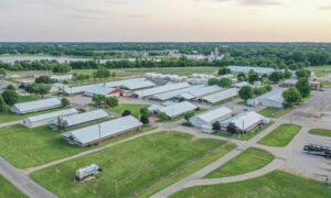Drone surveying manufacturing campus expansion - ALTA Survey Alabama Aerial view of a large manufacturing campus and surrounding grounds for drone surveying